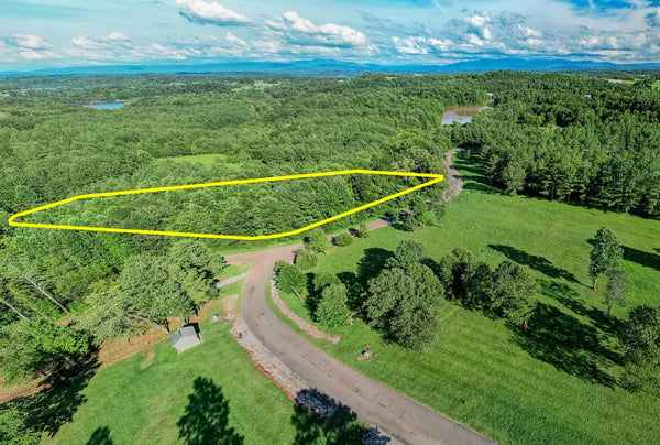 Beautiful large wooded 2.54 Acres lot with 3 side road with privacy and views. Close in to Tellico lake