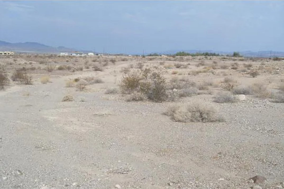 An Enticing Investment Opportunity! 5-Acre Parcel Sits Amidst The Tranquil Surroundings Of Bullhead City