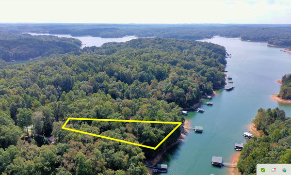 Spacious, wooded .50 Acre lot on stunning Lake Hartwell. Water front with Dock Permitted