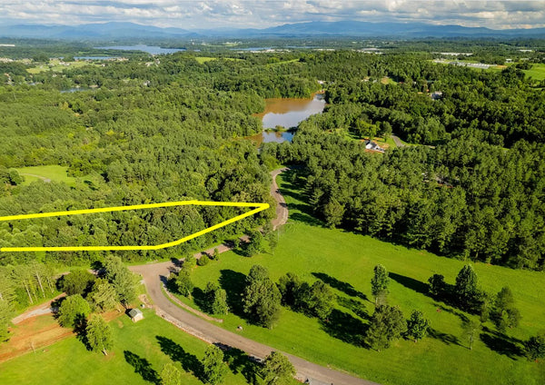 Beautiful large wooded 2.54 Acres lot with 3 side road with privacy and views. Close in to Tellico lake