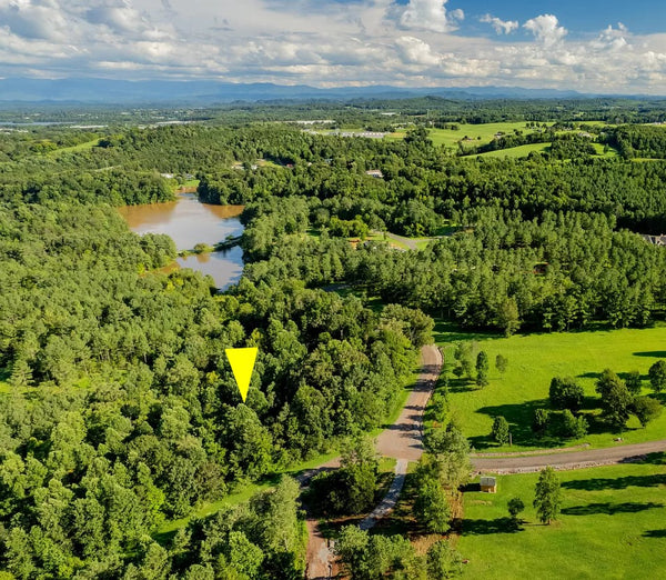 Beautiful large wooded 2.54 Acres lot with 3 side road with privacy and views. Close in to Tellico lake