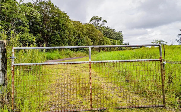 Own 8.33 acres of land where Country living meets Vintage Hawaiian lifestyle