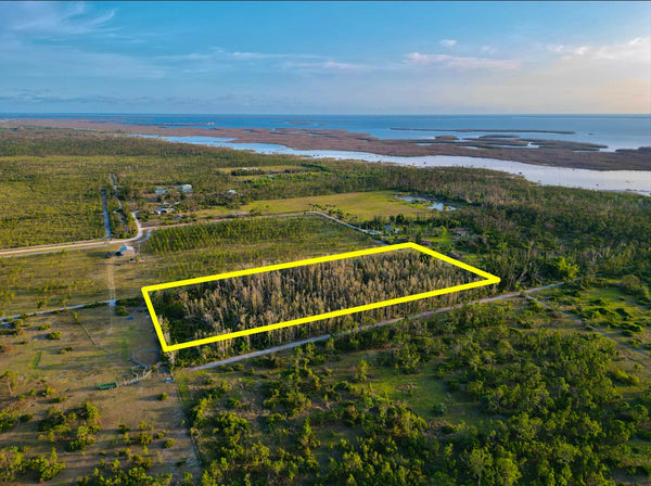 Great Investment! 5 Acre Lot with Island living is the perfect Florida lifestyle!